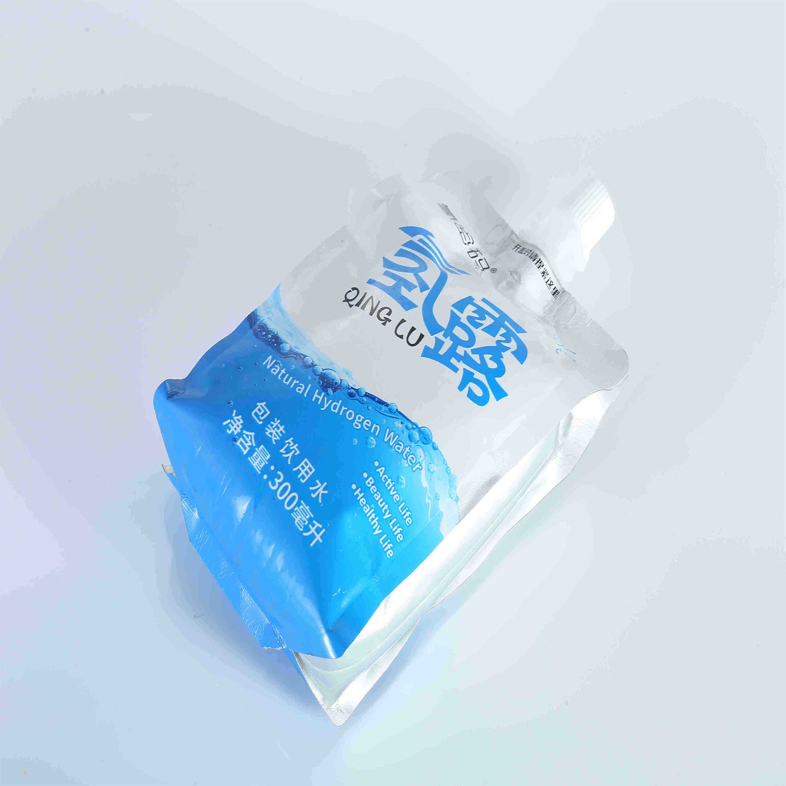 厂家直供300ml果茶饮料四边封铝箔吸嘴袋 冰川水富氢水自立吸嘴袋